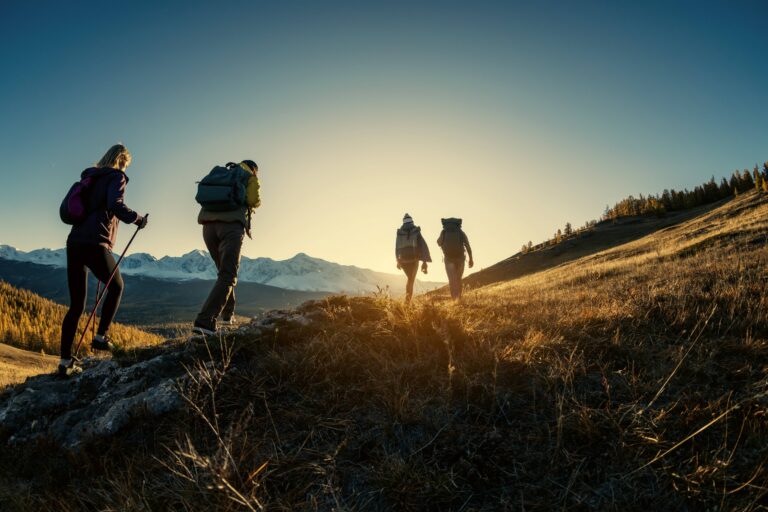 Hikers looking out over the mountains on one of the best hikes near Denver